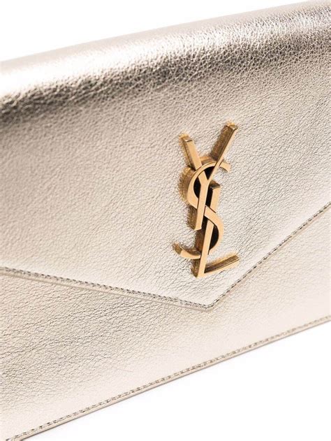 ysl cassandre gold clutch|SAINT LAURENT Cassandre large textured.